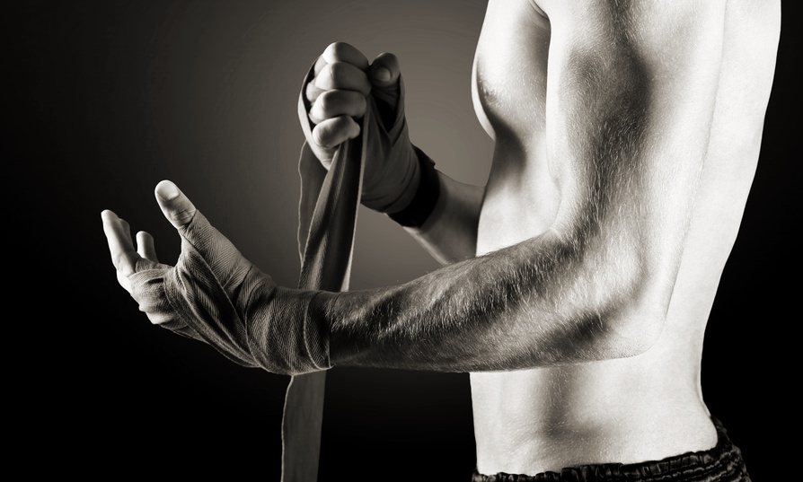 A person is prudently taking steps to minimize the risk of MMA injuries