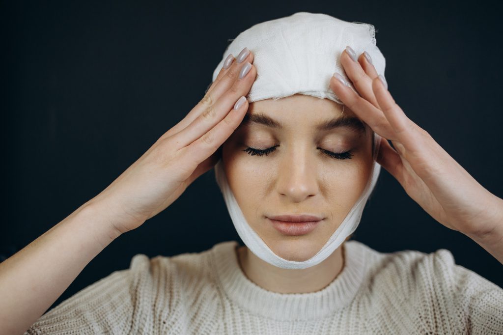 a woman has a concussion headaches