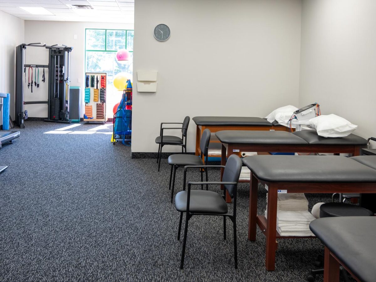 SportsMed Physical Therapy - Belleville, New Jersey - treadmills, weight machines, equipment storage and PT tables