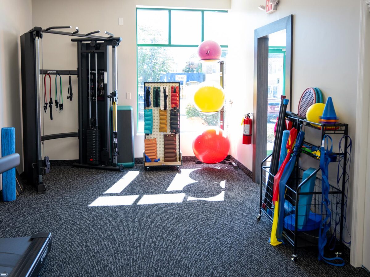 SportsMed Physical Therapy - Belleville, New Jersey - treadmills, weight machines and equipment storage